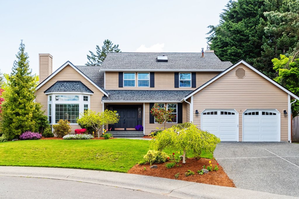 Warren Stone and Brick Estate with Triple Car Garage.jpg